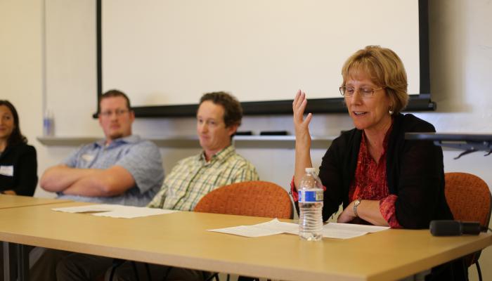Carol Genetti talks at the reunion panel
